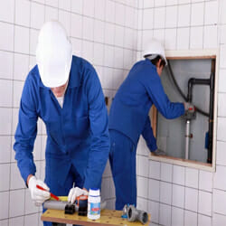 plumbers-working-together