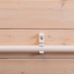 a Polybutylene pipe in a wooden light wall