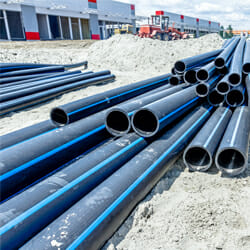 a pile of HDPE pipes