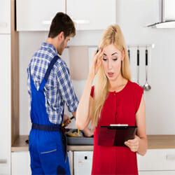 A woman got a headache because of the maintenance costs for gas and electric hot water