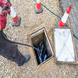 unblocking a clogged drain